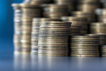 A stack of brass discs, products of the non-ferrous metal metallurgy industry