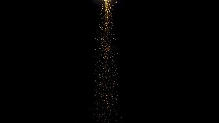 Glittering golden particles falling on a dark background - Powered by Adobe