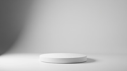 Minimalist white circular pedestal on light gray background