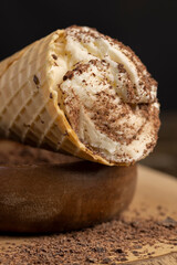 creamy white ice cream with chocolate pieces on the table