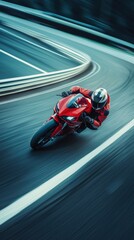 Top view of motorcyclist in red gear expertly leaning into sharp curve on a racing track, emphasizing control and speed in motorsport.