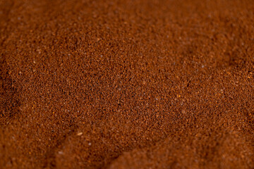 a large amount of ground coffee powder close  up