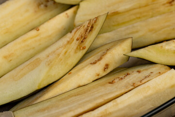 the flesh and seeds of sliced ripe eggplant