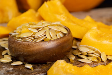 wet fresh seeds of ripe orange pumpkin