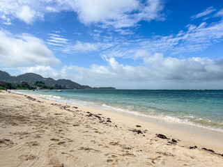 Amazing white sand beach with waves in Indian Ocean