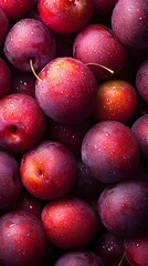Top View of Freshly Peeled Plums with Smooth Skin and Vibrant Colors Emphasized by Soft Focus Background