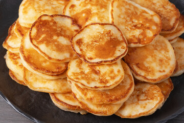 Delicious stack of golden pancakes close-up