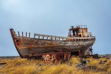 The wreck of an old fishing boat in the west of Iceland