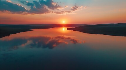 Naklejka premium Beautiful Sunrise Sunset over Calm Lake. Aerial view of lake