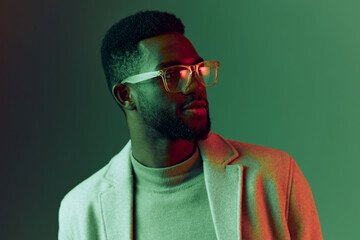 Stylish African man in glasses wearing a fashionable outfit, exuding confidence and elegance...