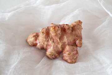 Close-up of isolated purple Jerusalem artichokes, topinambur