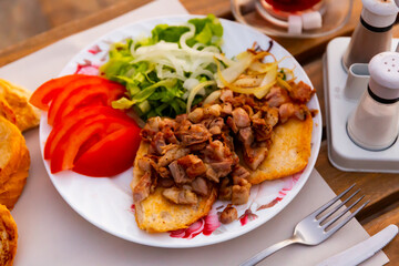 Image of a popular Turkish dish called Kokorech (Kokorec).