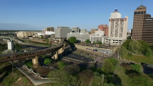 Memphis Cityscape in Tennessee. Architecture and Skyline. Mississippi River and Hernando de Soto Bridge. Trafic in Background. Drone