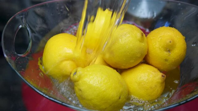 wash lemon Juicy fresh lemons falling into water, organic fruit vitamins, healthy nutrition