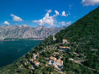 View of the Bay of Kotor and the seaside village of Gornji Stoliv. You can see the sea in the background