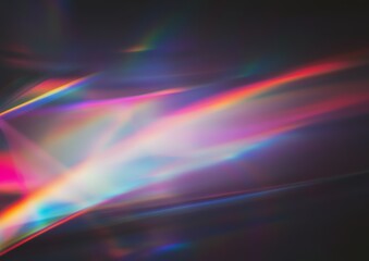 Abstract iridescent light streaks on a dark background. Shimmering colors create a surreal and dreamy atmosphere.