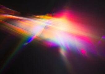 Fototapeta premium Vibrant streaks of light illuminate the darkness. A colorful abstract image.