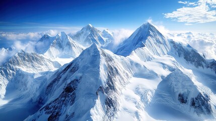 Obraz premium Aerial view of majestic snow-capped Himalayas, clouds below, adventure tourism