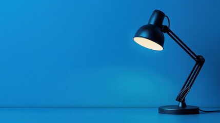 Illuminated desk lamp, blue background, workspace, study (3)