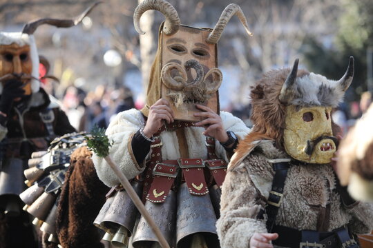 The Surva masquerade games festival in Sofia, Bulgaria. People called Kukeri parade in masks and ritual costumes, perform ritual dances to drive away evil spirits in Sofia, Bulgaria
