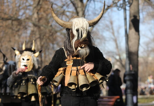 The Surva masquerade games festival in Sofia, Bulgaria. People called Kukeri parade in masks and ritual costumes, perform ritual dances to drive away evil spirits in Sofia, Bulgaria
