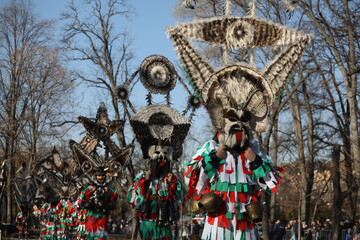 The Surva masquerade games festival in Sofia, Bulgaria. People called Kukeri parade in masks and ritual costumes, perform ritual dances to drive away evil spirits in Sofia, Bulgaria