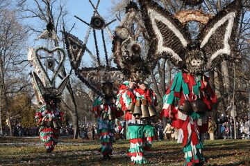 The Surva masquerade games festival in Sofia, Bulgaria. People called Kukeri parade in masks and ritual costumes, perform ritual dances to drive away evil spirits in Sofia, Bulgaria