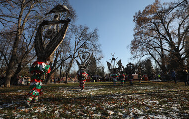 The Surva masquerade games festival in Sofia, Bulgaria. People called Kukeri parade in masks and ritual costumes, perform ritual dances to drive away evil spirits in Sofia, Bulgaria