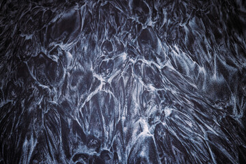 Abstract Texture of Frost Water Surface Swirling Patterns in Dark and Light Tones. Frozen Sea or lake background