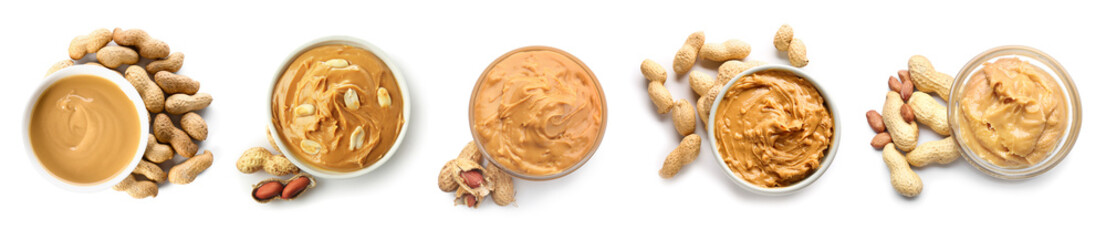 Set of bowls with tasty peanut butter on white background, top view