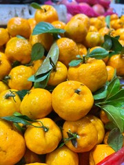 pile of fresh oranges in the fruit shop