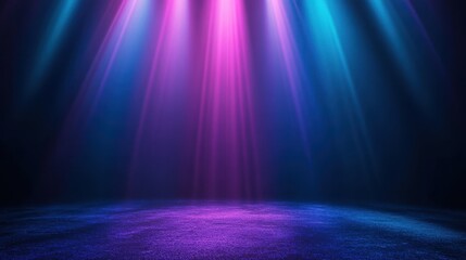 Obraz premium Colorful stage lights with pink and blue hues illuminating an empty floor