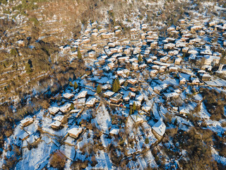 Aerial Winter Sunset view of Village of Kovachevitsa, Bulgaria