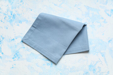 Clean napkin on blue grunge background