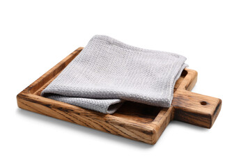 Wooden cutting board and grey napkin on white background