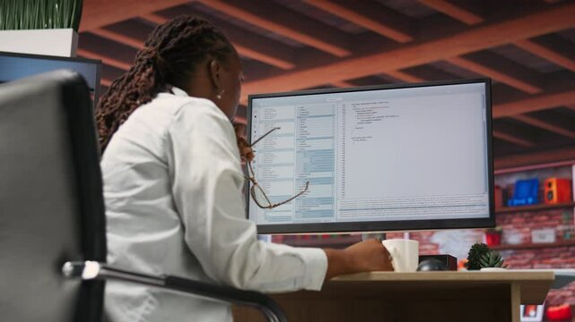 Irked software developer frustrated while coding, struggling to implement algorithms. Unhappy IT expert annoyed while working with code editor, unable to optimize performance, camera B
