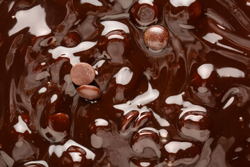 Sweet hot chocolate with chips as background, closeup