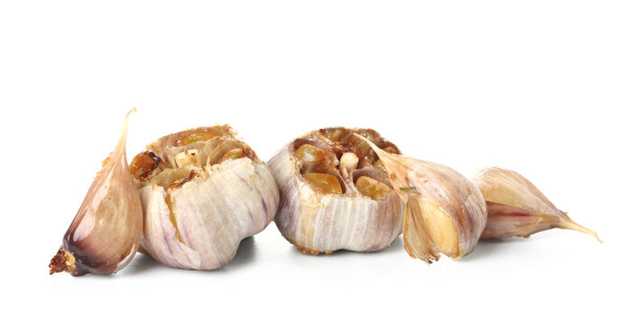 Baked garlic on white background
