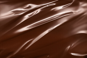 Melted milk chocolate as background