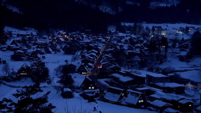 Gifu,Japan - January 19, 2025: Panoramic view of illuminated thatched roof houses in Shirakawago, Gifu, Japan