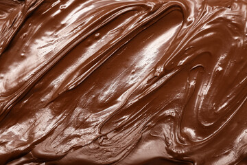 Melted milk chocolate as background