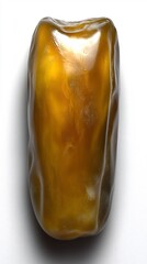Fresh date fruit showcasing its shiny slightly wrinkled surface isolated against white
