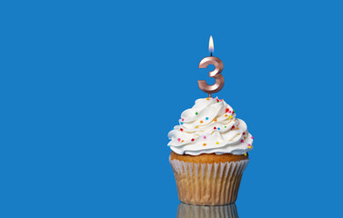 Birthday Or Anniversary Cupcake with Lit Candle; Number 3 Candle.