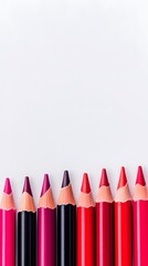 Ten Sharpened Colored Pencils in Shades of Red and Pink