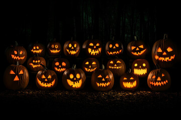 Glowing Jack-o'-lanterns Illuminate the Spooky Forest Floor in the Dark of Night