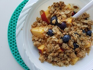 Yogurt and granola with fruit