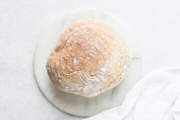 Overhead view of homemade artisan bread, top view of baked sourdough artisan bread