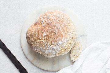Overhead view of sliced homemade artisan bread, top view of baked sourdough artisan bread slices