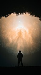 Fototapeta premium Person Silhouetted Against Cosmic Galaxy Light Projection