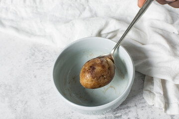 cinnamon swirl cookie dough about to be baked, a scoop of cinnamon vanilla cookie dough, process of making cinnamon sugar cookies